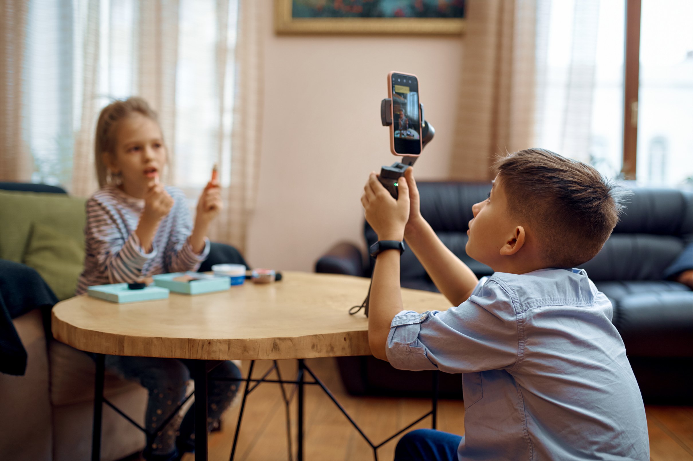 Two Children Bloggers Records Blog on Camera